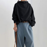 Christine | Top casual con colletto alto