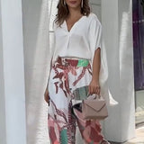 Conjunto Elegancia Tropical - Blusa fluida + pantalón estampado