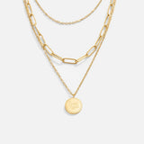 Léa – Un delicato collier multistrato in oro dalle linee eleganti
