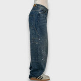 Nolene – Jeans con finitura scintillante e carattere urbano